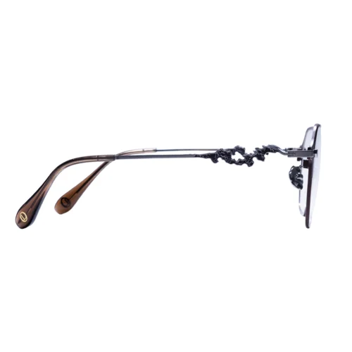 Side profile of titanium OpteLux OSZCN079 round frames with ornate temple design