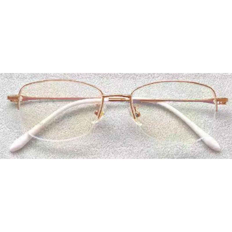 Front view of warm gold half-rim glasses with white curved temples
