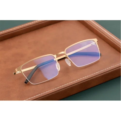 OpteLux OSZ968 gold titanium business semi-rimless glasses – luxury rectangular half-frame eyewear.